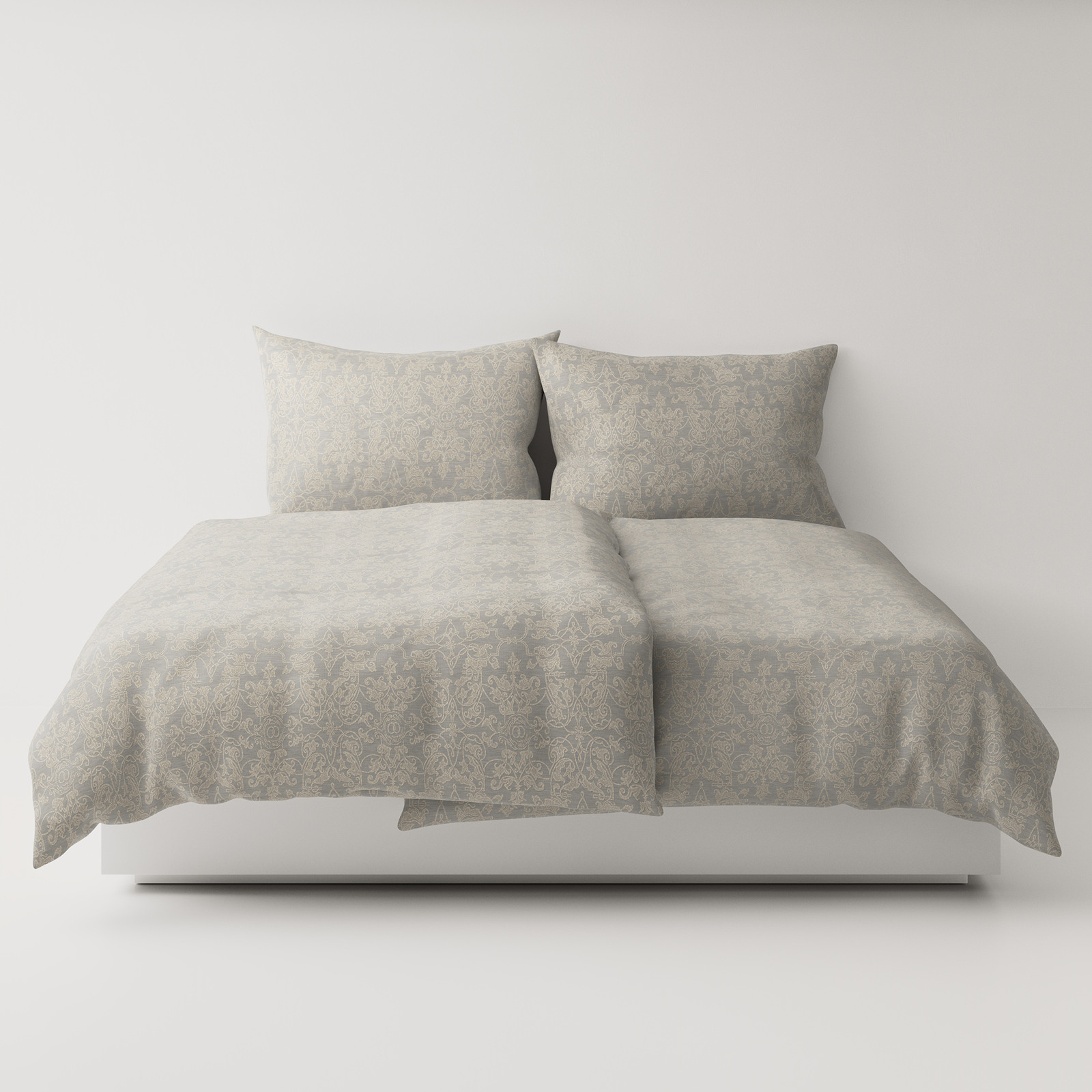 A bed with two pillows on top.