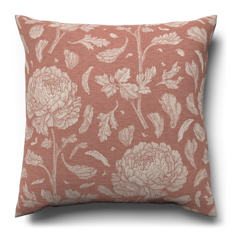 A cushion with a floral pattern on it.