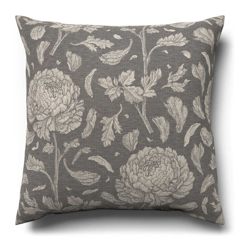 A gray and white cushion with a floral pattern.