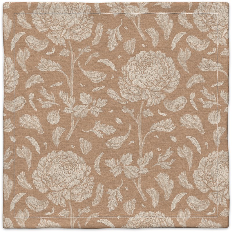 A brown and white floral pattern on a linen background.
