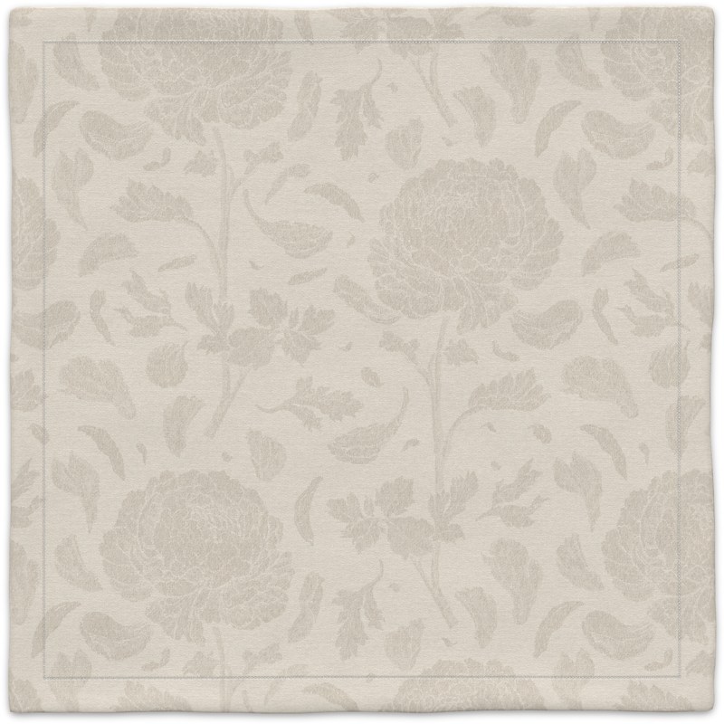 A white carpet with a floral pattern.