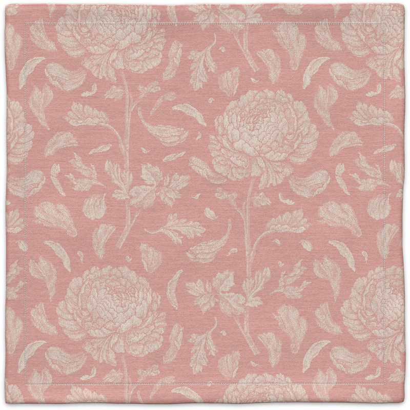 A pink and white carpet with flowers on it.