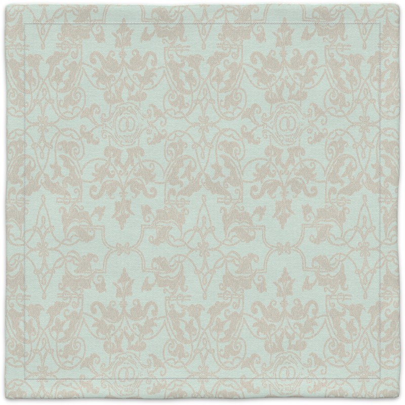 A light blue and beige carpet with a pattern on it.