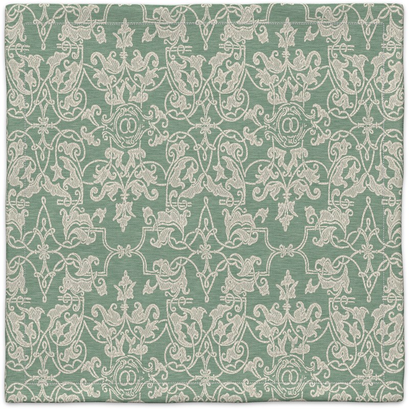 A green carpet with white patterns on it.