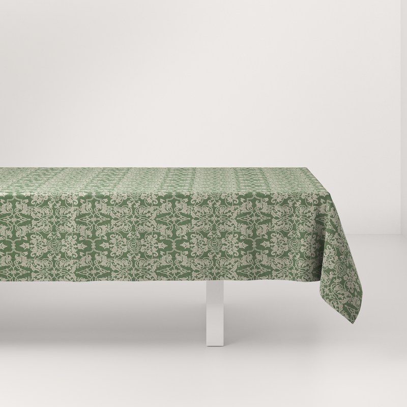 A table with a green tablecloth on it.
