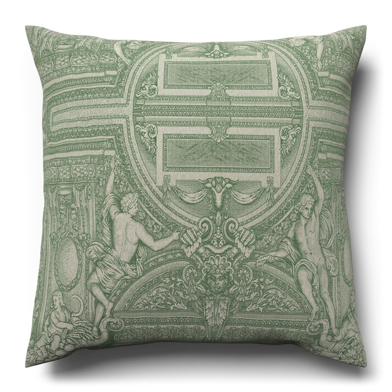 A green cushion with a decorative pattern on it.