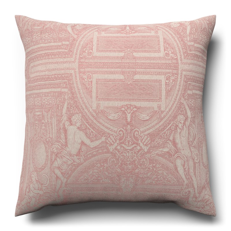 A pink and white cushion with a decorative pattern.