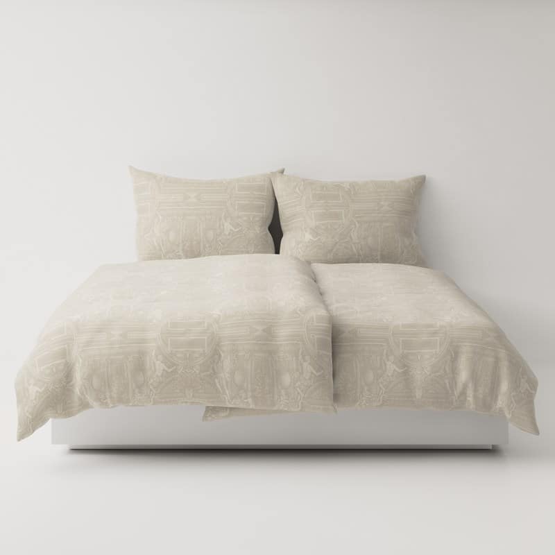 A bed with two pillows on top.