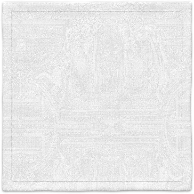 A white napkin with a pattern on it.