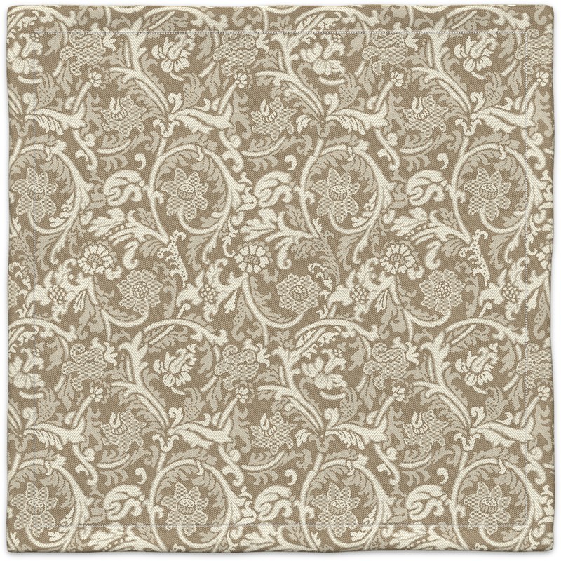 A brown and white carpet with a floral pattern.