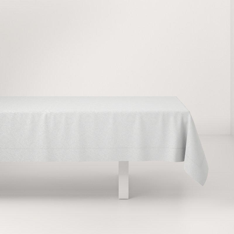 A table with a white tablecloth on it.