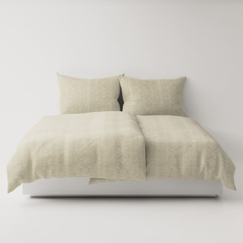 A bed with two pillows on top.