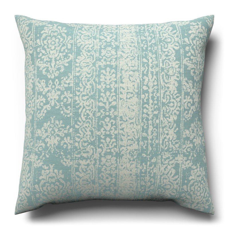 A blue and white cushion on a white background.