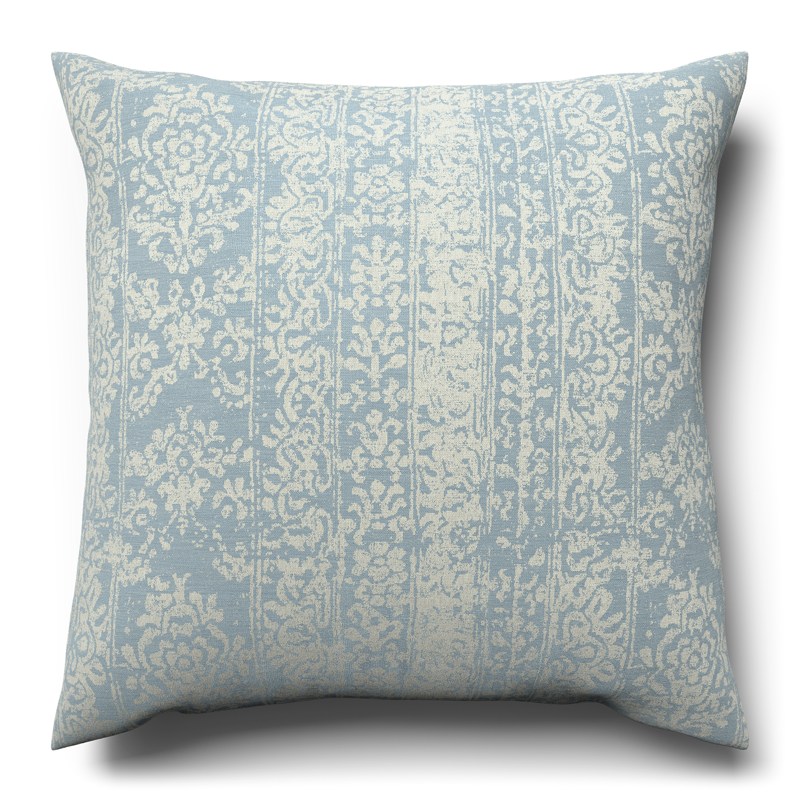 A blue and white cushion on a white background.