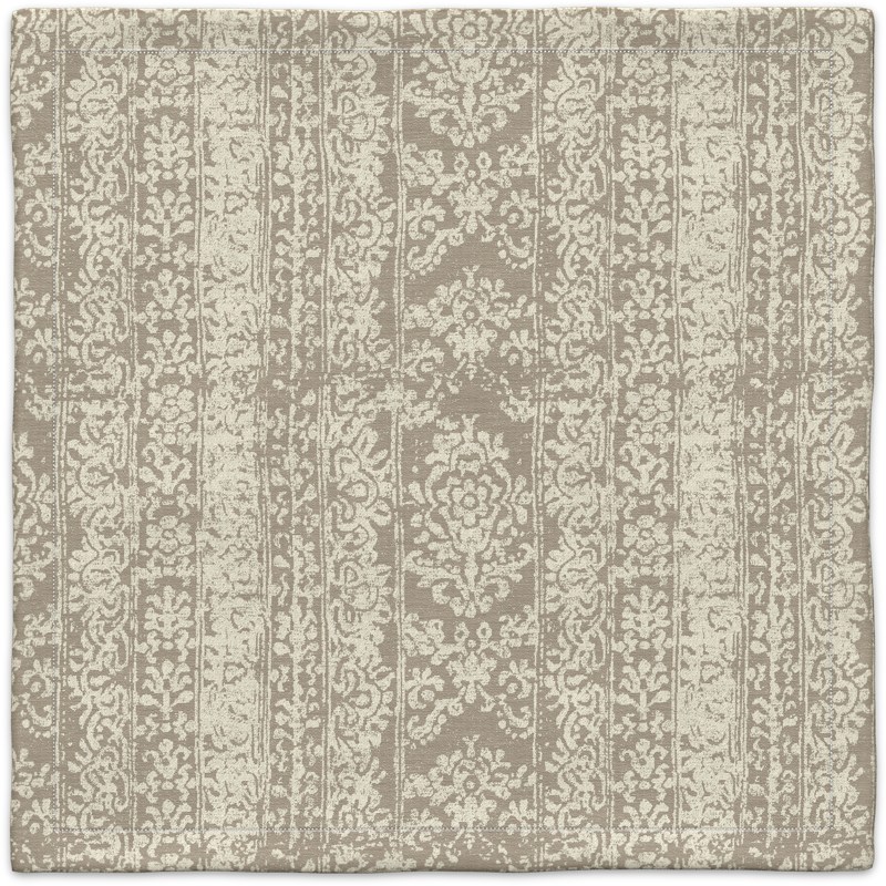 A beige and white carpet on a white background.