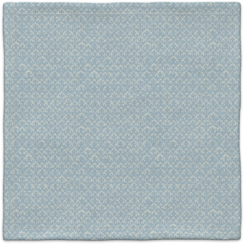 A blue carpet with a pattern on it.