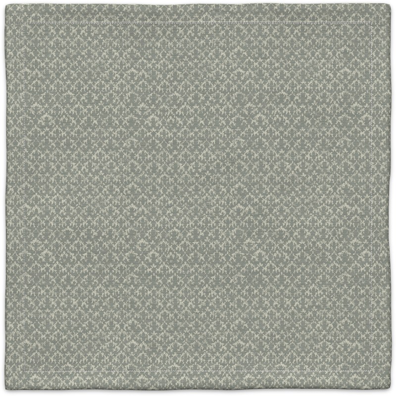 A gray carpet with a pattern on it.