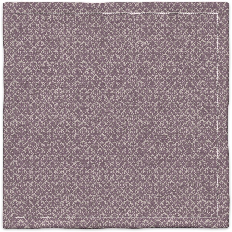 A close-up of a purple and white carpet.