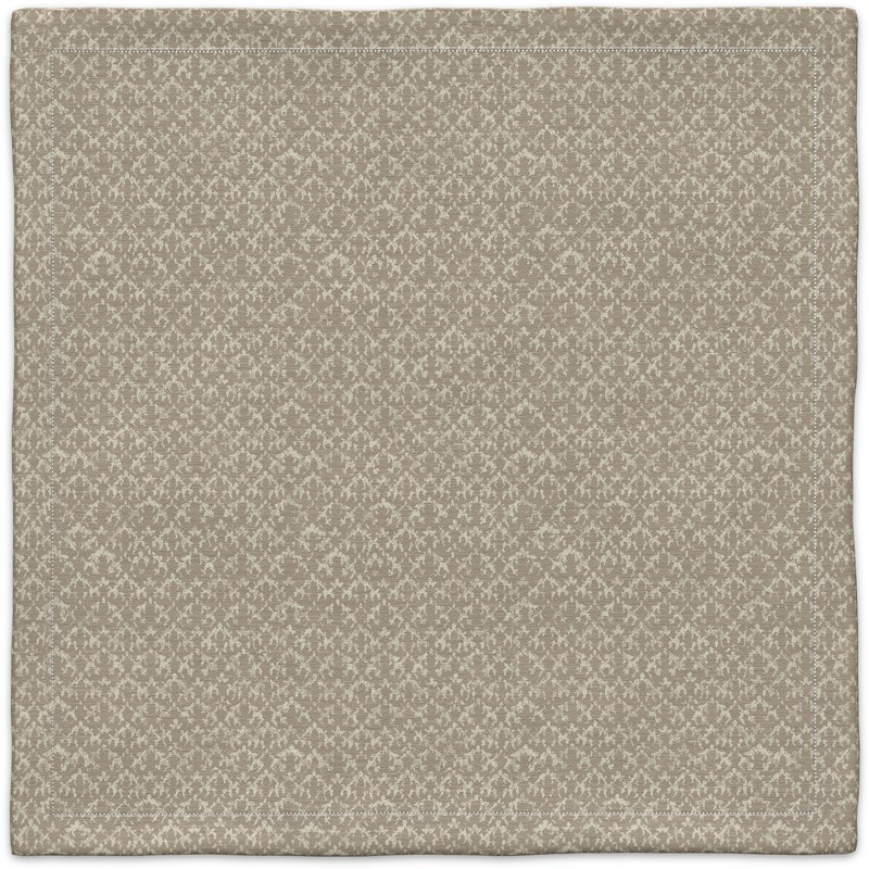 A beige carpet with a pattern on it.