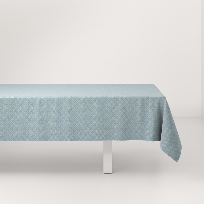 A table with a blue tablecloth on it.