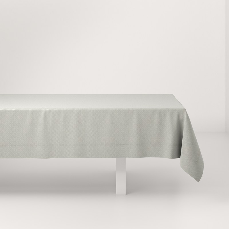 A table with a white tablecloth on it.