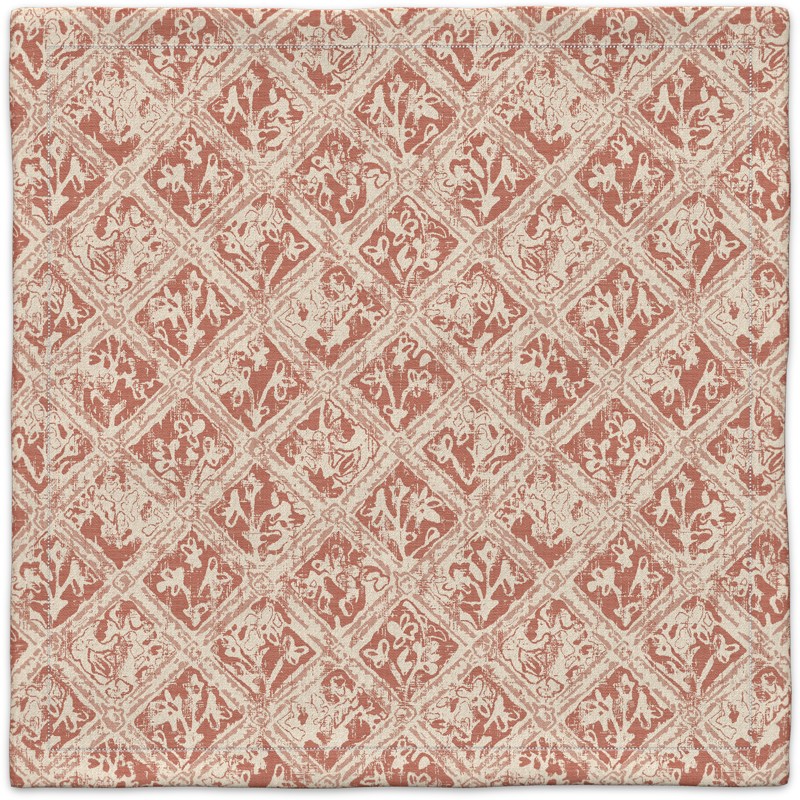 A red and white carpet with a pattern on it.