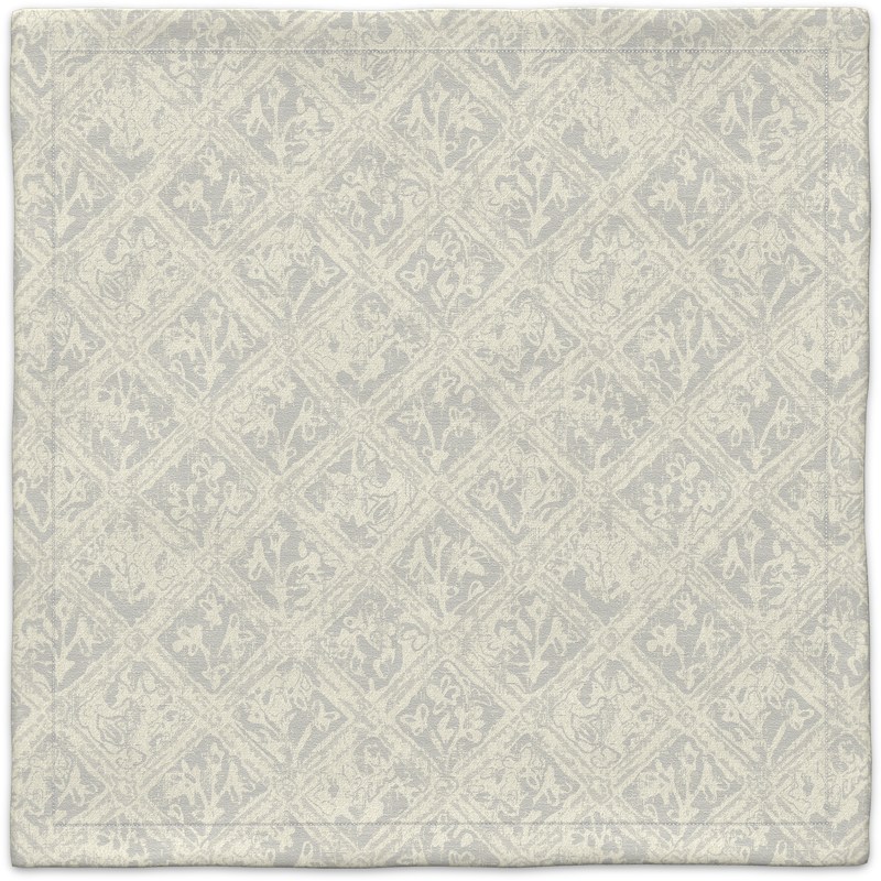 A white and gray carpet with a pattern on it.