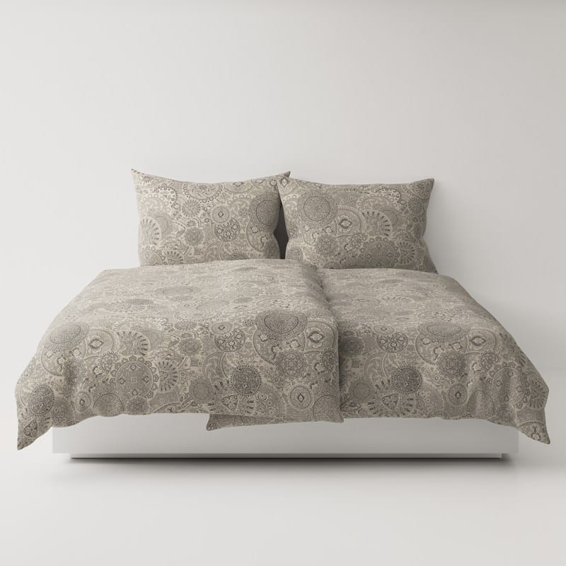 A bed with two pillows on top.