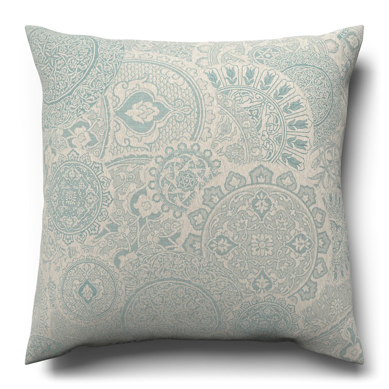 A blue and white cushion on a white background.