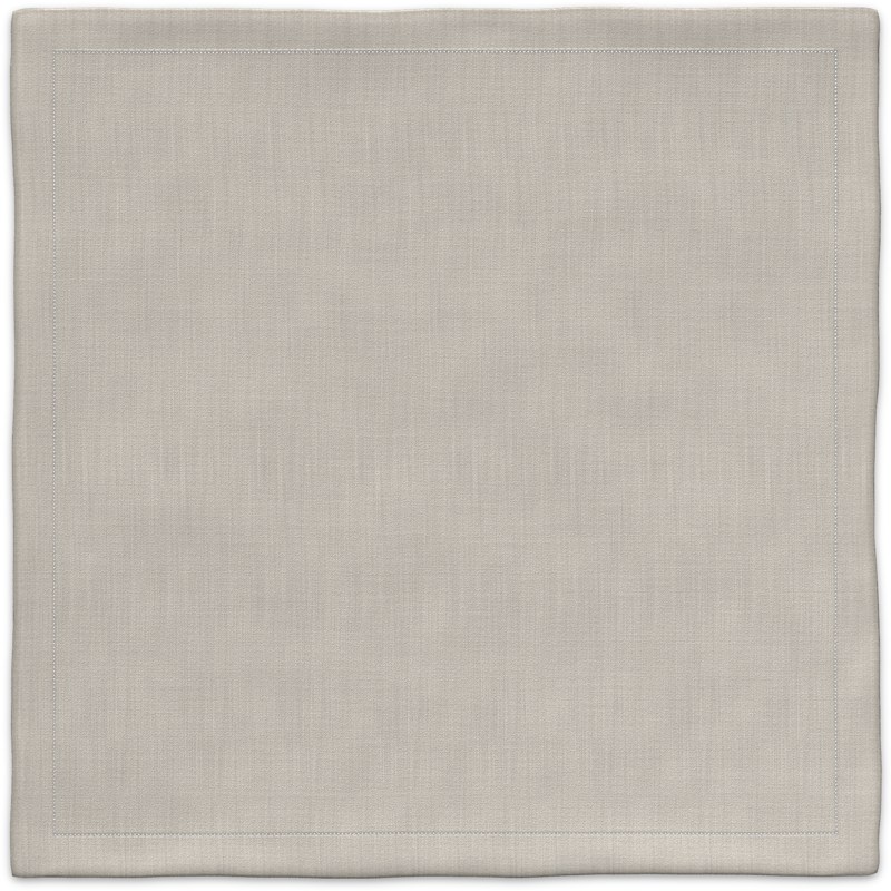 A simple linen placemat with a white border.