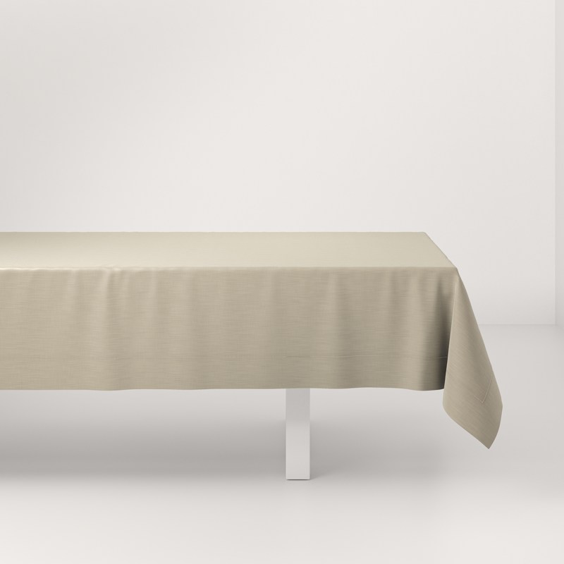 A table with a white tablecloth on it.