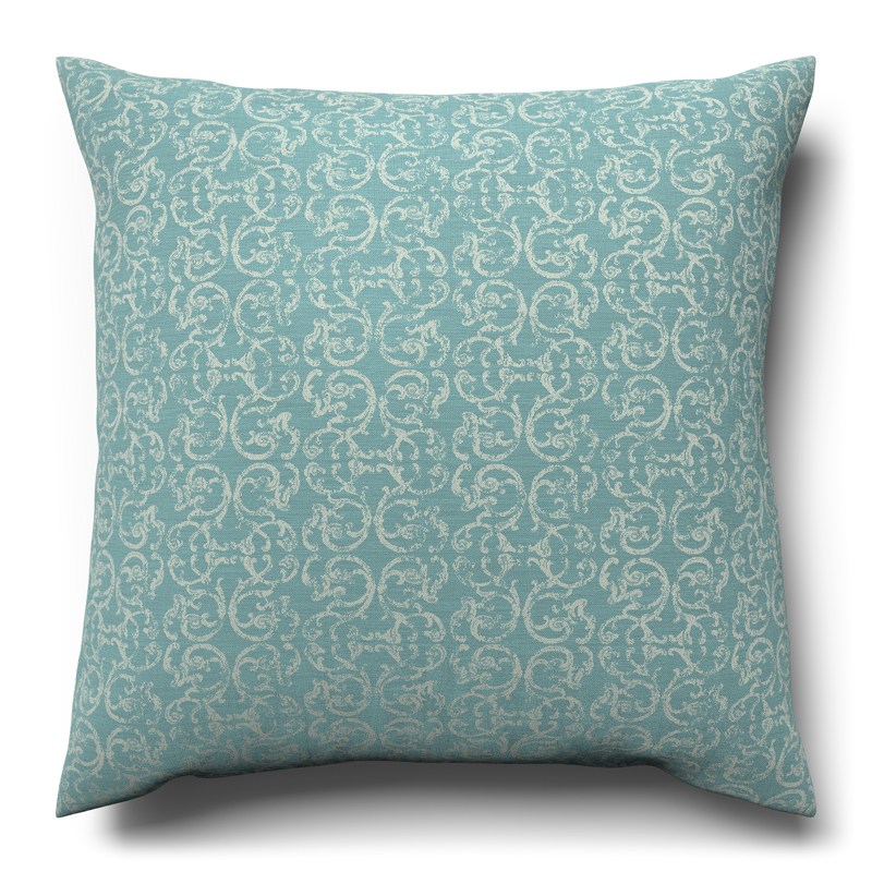 A blue cushion with a white pattern on it.