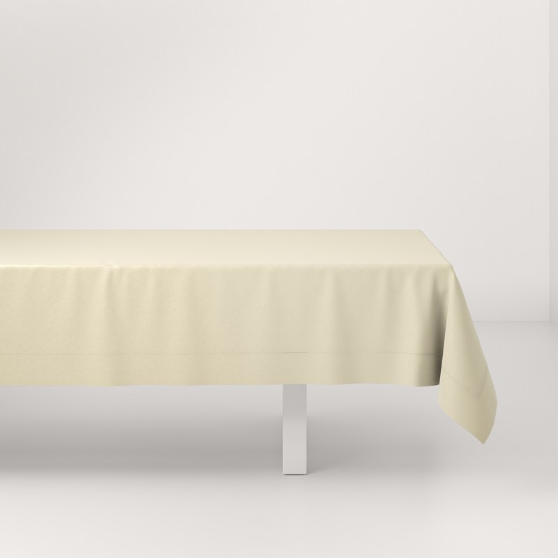 A table with a white tablecloth on it.