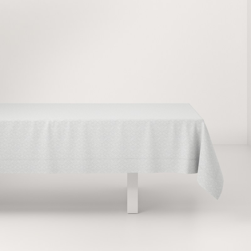 A table with a white tablecloth on it.