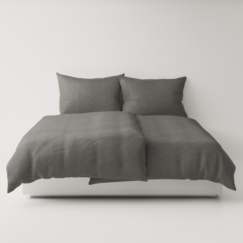 A bed with a gray comforter and two pillows.