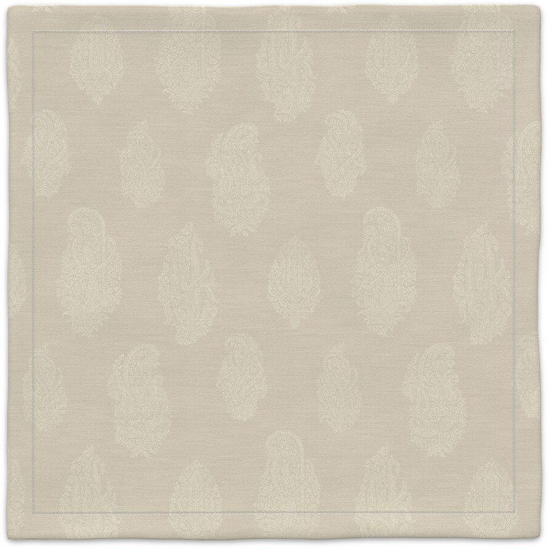 A white carpet with a leaf pattern on it.