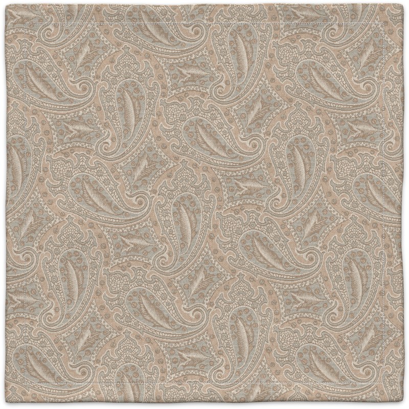 A beige paisley pattern on a white background.