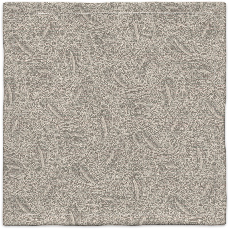 A gray paisley pattern on a white background.