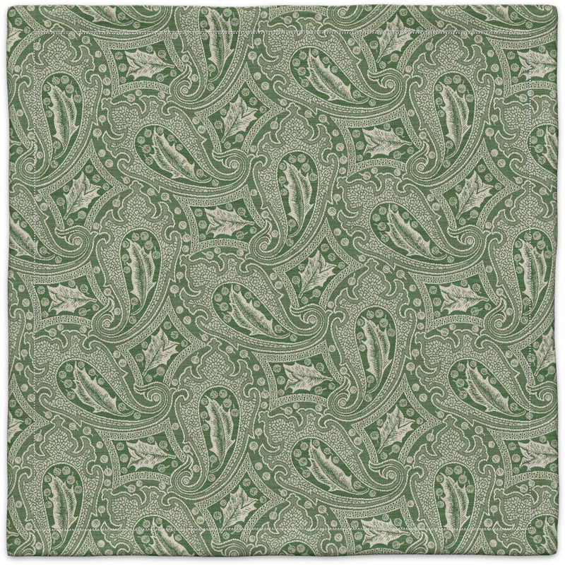 A green paisley pattern on a white background.