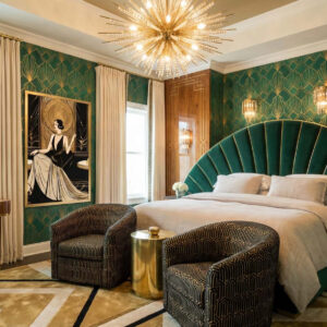 Ein Bett im Art Deko Stil mit Leinen Bettwäsche