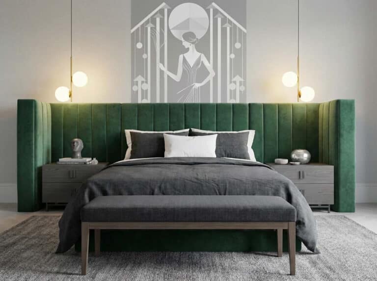 A bedroom with a green headboard and a grey bed.
