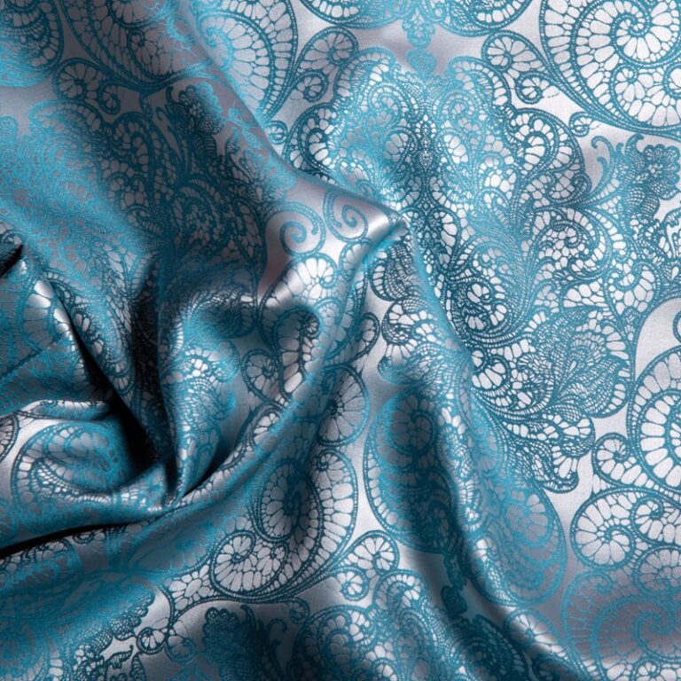 A close-up of a blue and white fabric.