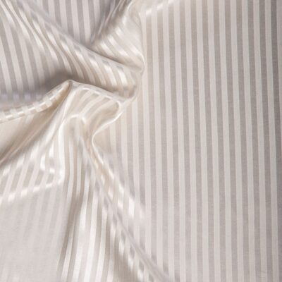 A close-up of a white and gray striped fabric.
