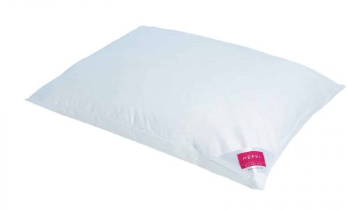 A plain white rectangular pillow with a small red and white brand label reading HEFEL on one corner, on a white background.